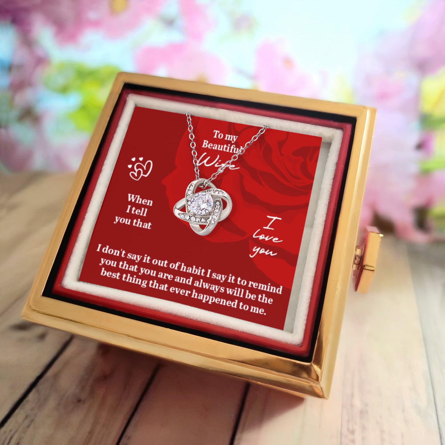 Preserved Rose and Love Knot Necklace in a Rotating Box
